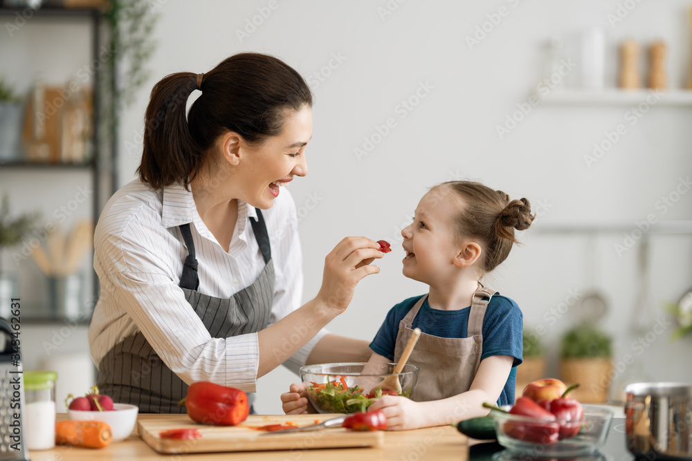 Happy family in the kitchen.