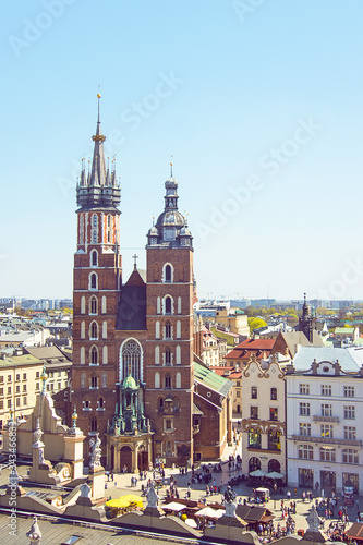 Beautiful view on Krakow famous landmark - St. Mary s Basilica  Mariacki Gothic Church and Old Town of Krakow  made from the viewpoint on Town Hall. Travel concept
