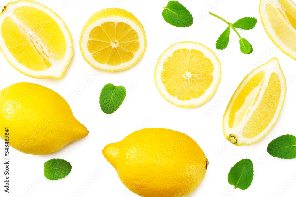 Naklejka lemon with slices and green leaf isolated on white background . top view