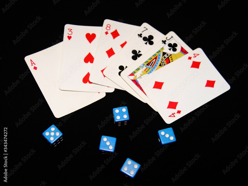 Obraz premium Dice and cards on the table.