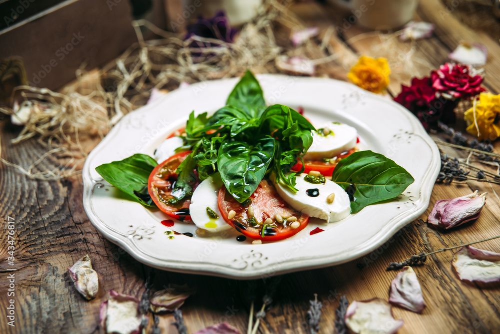 Italian caprese salad tomatoes and mozzarella Italian caprese salad tomatoes and mozzarella