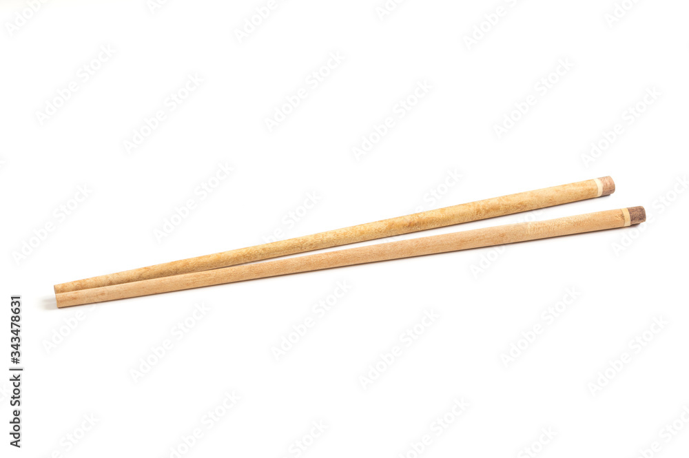 Wooden chopsticks isolated on white . Wooden chopsticks isolated on white .
