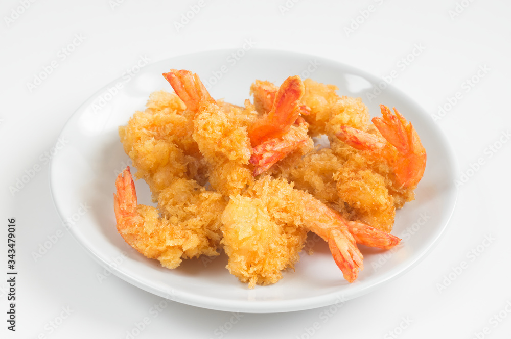 Fried shrimps on ceramic plate,white background. Fried shrimps on ceramic plate,white background.