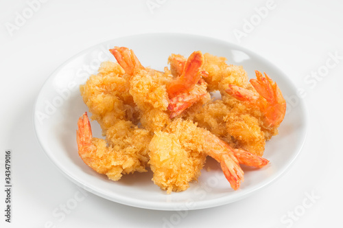 Fried shrimps on ceramic plate,white background.