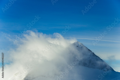 Rocky top Austrian Alps shrouded in cloud © gluk_nfl