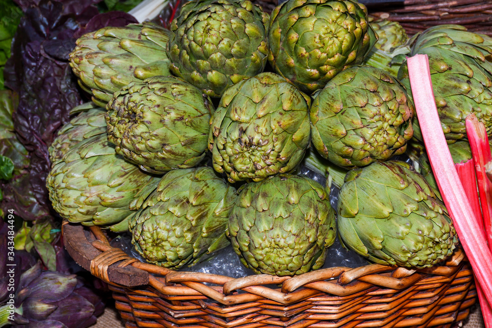Fototapeta premium Green and red artichoke.Local produce for sale