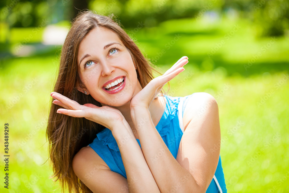 Close up portrait of beautiful young happy brunette woman with fresh and clean skin, summer street outdoors Close up portrait of beautiful young happy brunette woman with fresh and clean skin, summer street outdoors