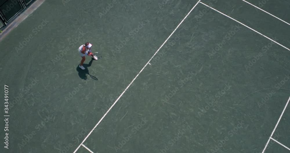 Aerial view of Girl playing tennis Aerial view of Girl playing tennis
