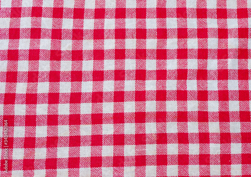 Red and white colour of gingham cotton texture 
