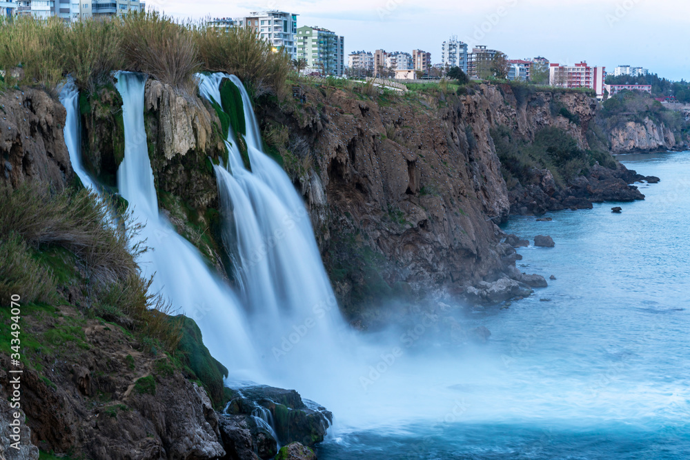 The beautiful sunset scene of Duden waterfall at Antalya, Turkey The beautiful sunset scene of Duden waterfall at Antalya, Turkey