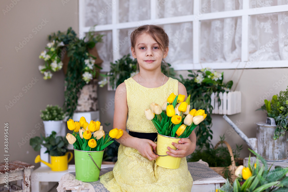 blonde girl in yellow dress with bouquet of tulips blonde girl in yellow dress with bouquet of tulips