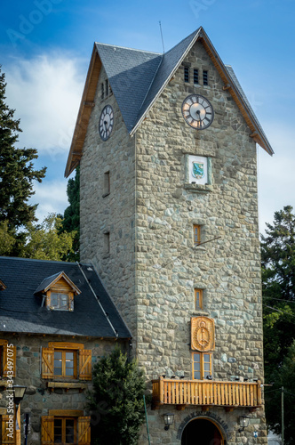 Clock tower of the civic center of Bariloche, Argentina. A sunny day in March. photo