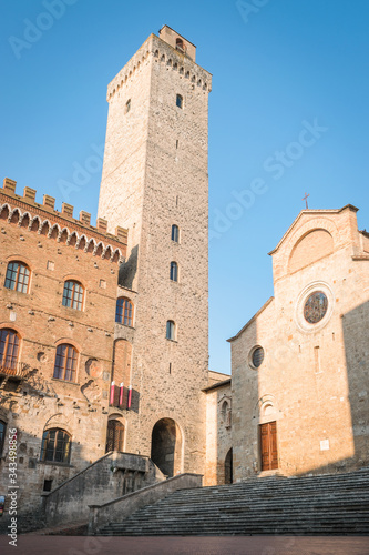 View of the famous towers from the historic center of the village of San Gimignano, a heritage of humanity, on a summer morning