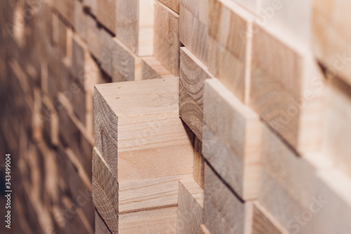 Blocks of wood neatly arranged on a pile photo