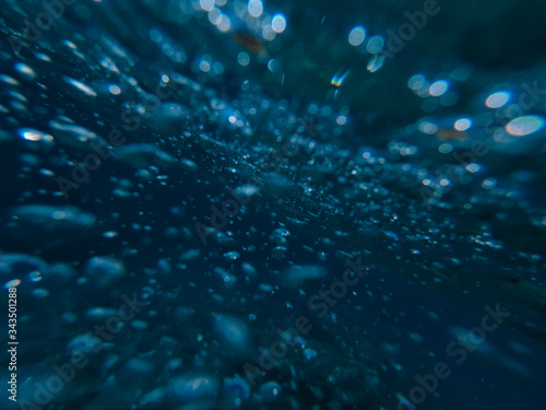 The surface of the water from under the water close-up.