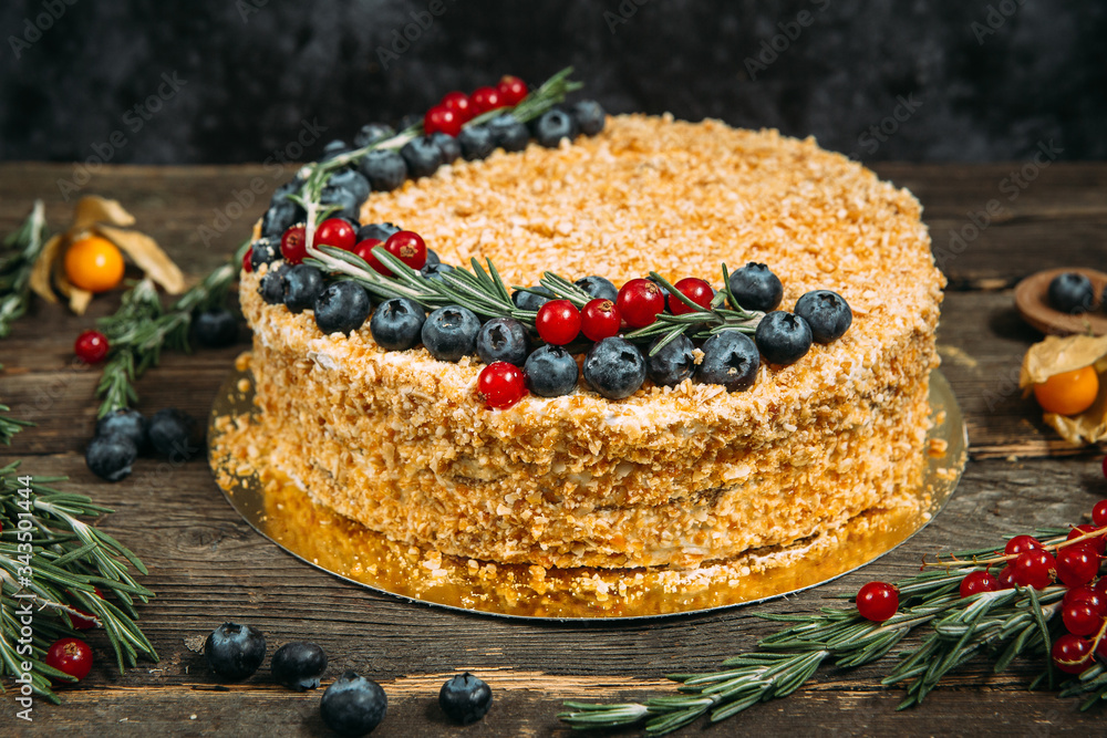 Gourmet sweet appetizing honey cake with berries Gourmet sweet appetizing honey cake with berries