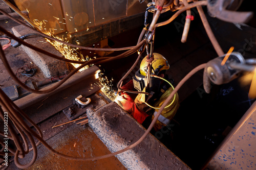 Fotografie Safe work practices rope access abseiler worker wearing a fall industrial safety
