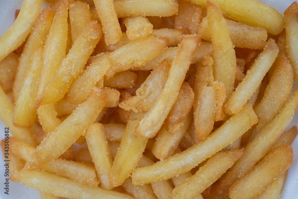 Close up french fries textured background. Close up french fries textured background.