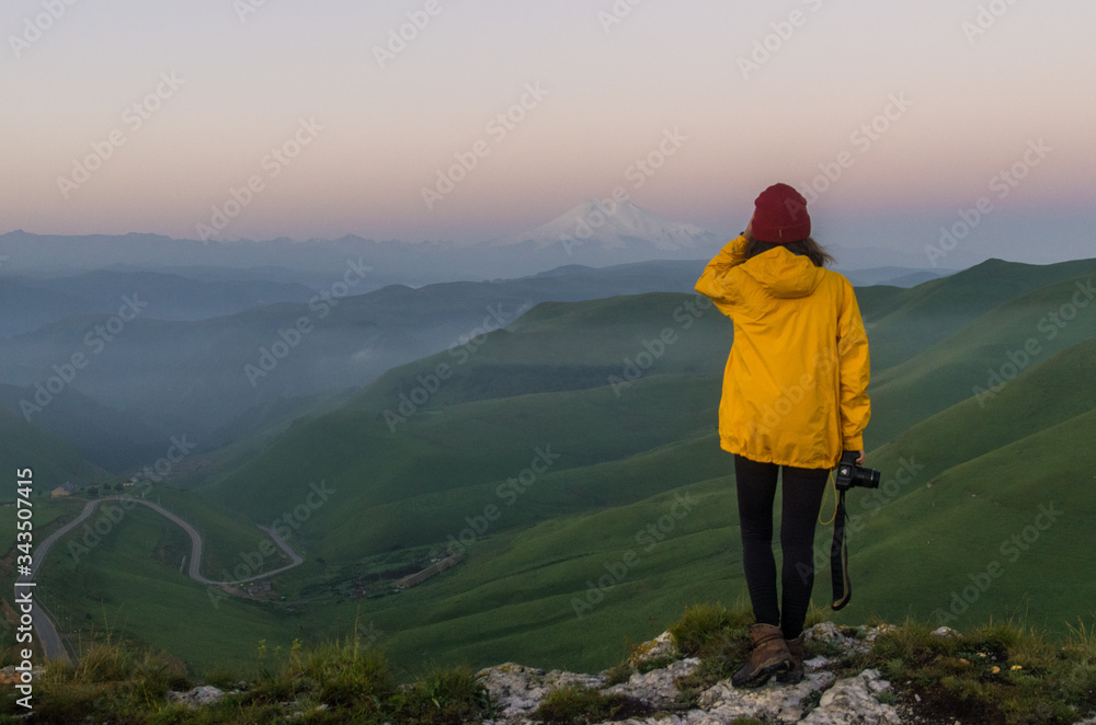 hiker on top of mountain