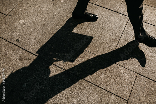 silhouette of a man walking