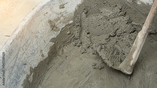 Mix cement in large tanks for construction in house construction.