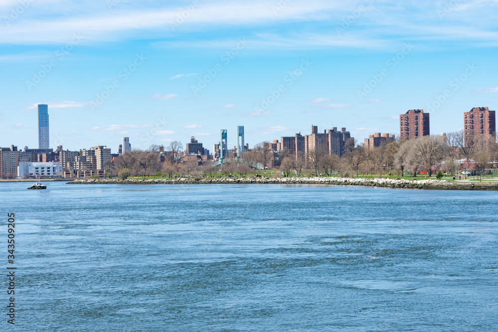 Waterfront of Randalls and Wards Islands during Spring along the East River in New York City