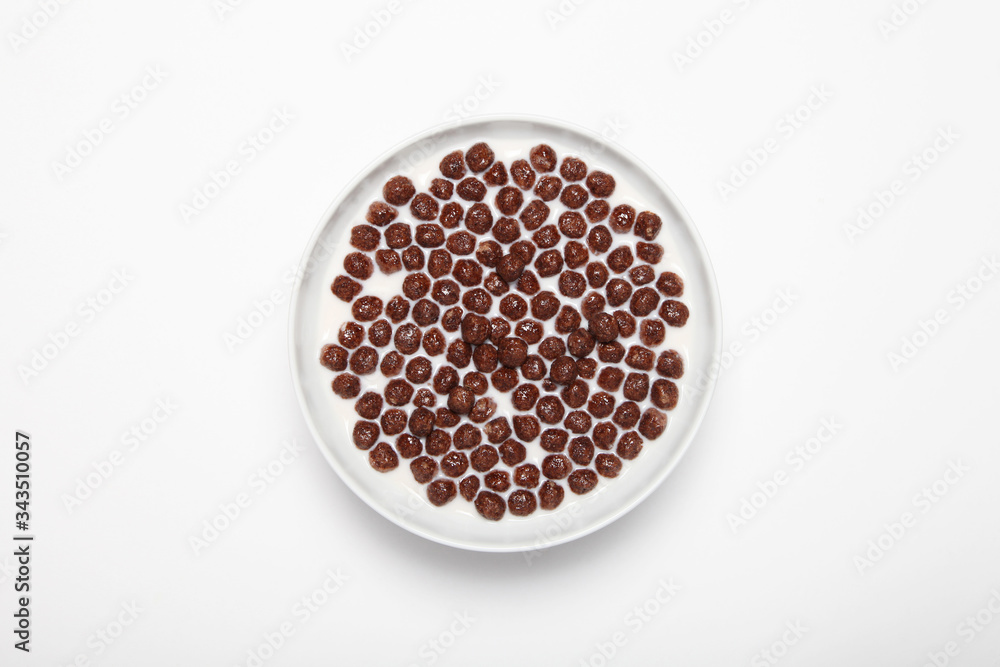 Ceramic plate with chocolate cereal balls isolated on a white background
Ceramic plate with chocolate cereal balls isolated on a white background