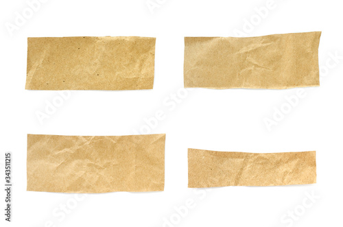 Recycled paper craft stick on a white background. Brown paper torn or ripped pieces of paper isolated on white background. 