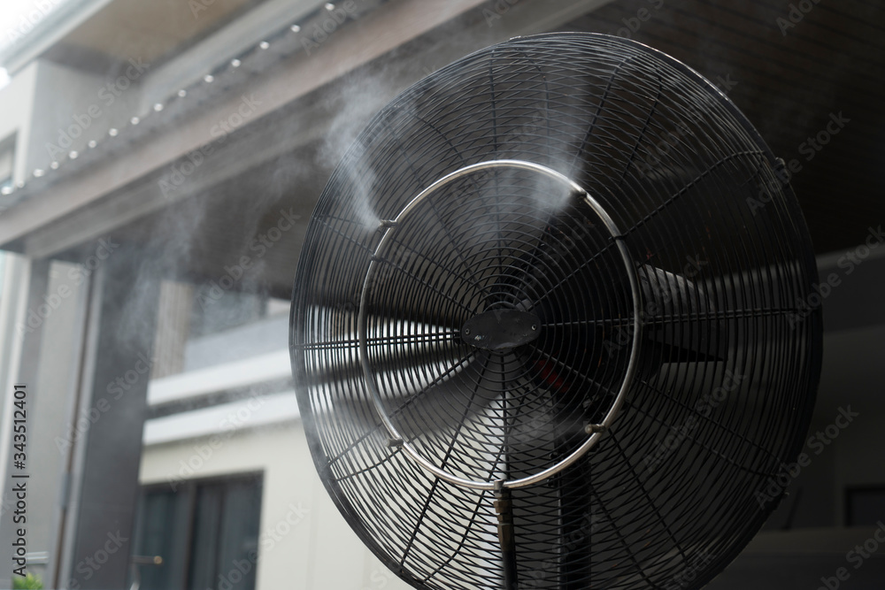 Outdoor electric mist fan, For hot weather. Stock Photo Adobe Stock