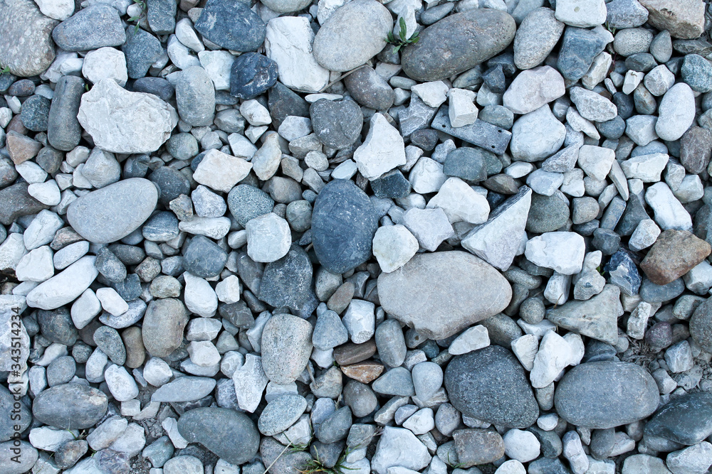 Gray stones lie on the ground. Background for wallpaper. Desktop. Gray stones lie on the ground. Background for wallpaper. Desktop.