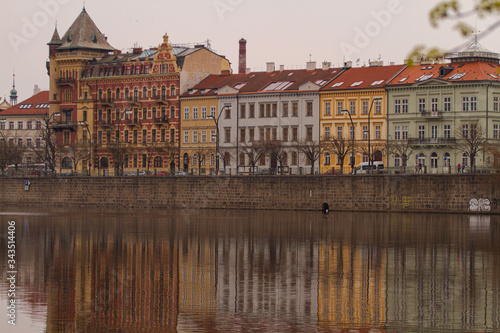  view of the river and reflections in it. Old Prague architecture by the river Vltava. In the Czech Republic © svetjekolem