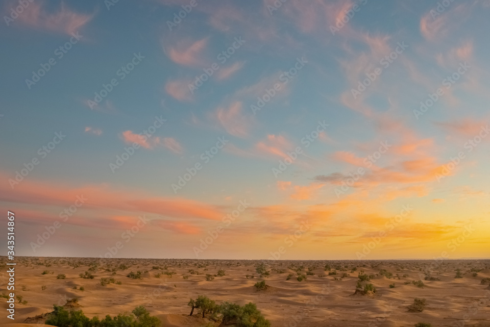 Colorful sunset at the Sahara desert of Zagora, Mhamid, Morocco