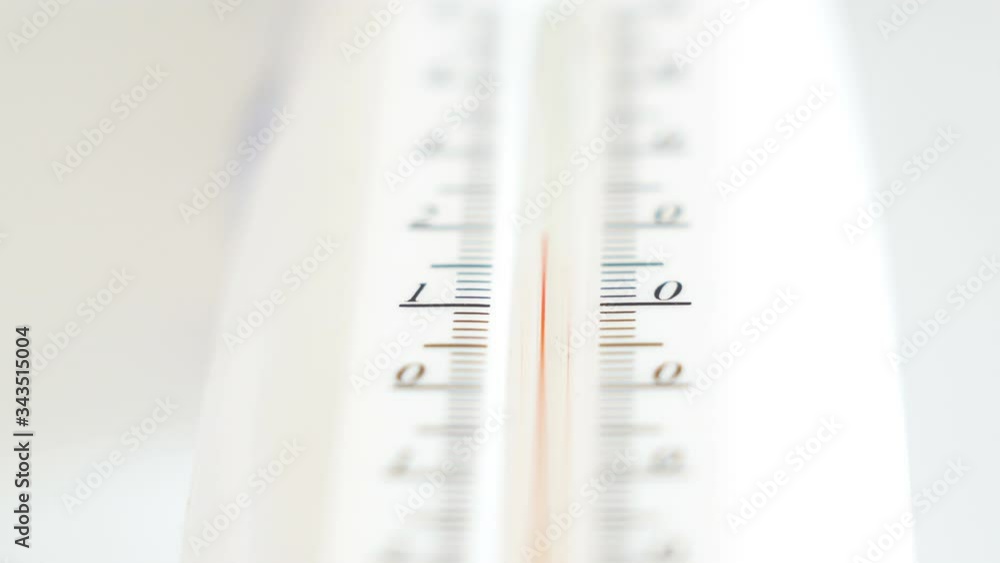 Closer look of the red mercury inside the room thermometer Closer look of the red mercury inside the room thermometer