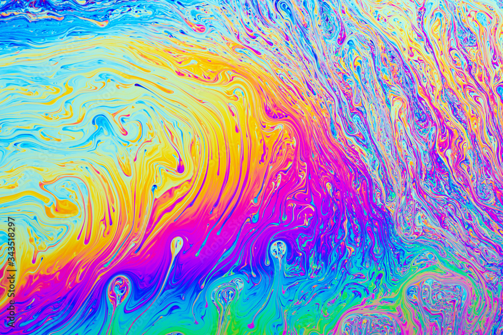 Colorful psychedelic abstract formed by light on the surface of a soap bubble
