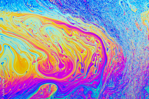 Psychedelic abstract formed by light interference on the surface of a soap bubble