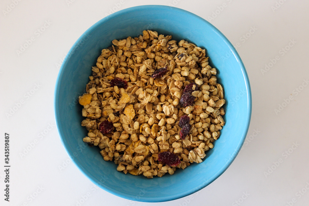 Healthy bowl of muesli, apple, fruit, nuts for a nutritious breakfast of energy for the day Healthy bowl of muesli, apple, fruit, nuts for a nutritious breakfast of energy for the day
