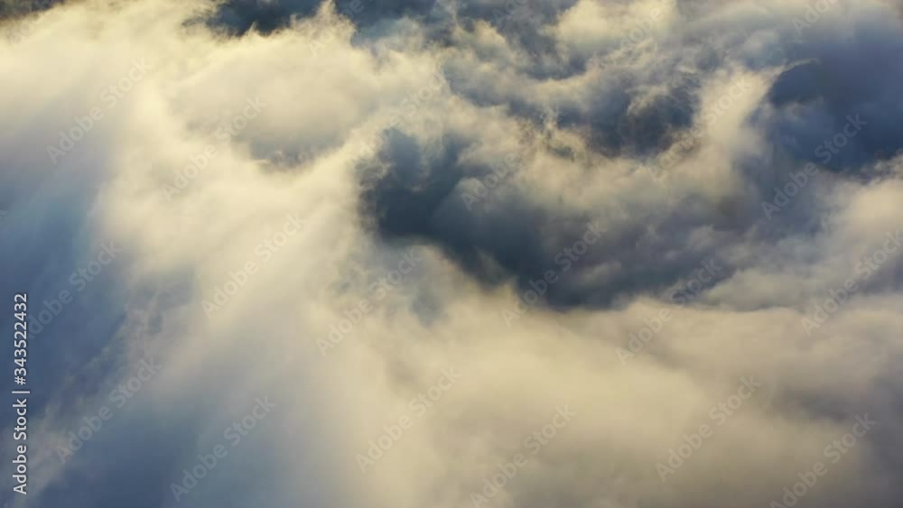 Early morning sunlight illuminates the thick marine layer as it flows over valleys in Northern California. West of these tranquil hills and valleys is the densely populated area of San Francisco Bay. Early morning sunlight illuminates the thick marine layer as it flows over valleys in Northern California. West of these tranquil hills and valleys is the densely populated area of San Francisco Bay.