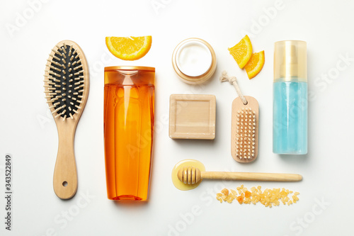 Flat lay with cosmetics and natural ingredients on white background