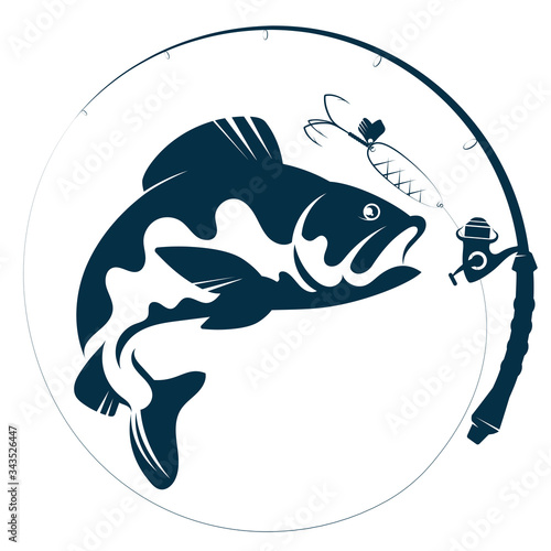 Fish jumping for bait and fishing rod silhouette