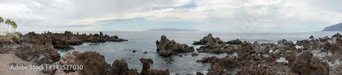 View from volcanogenic rocks towards Gomera island, Tenerife, Canary. photo