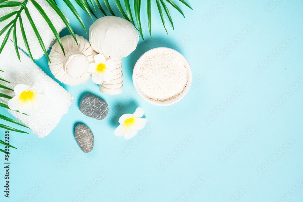 Spa herbal compressing balls on blue background. Spa herbal compressing balls on blue background.