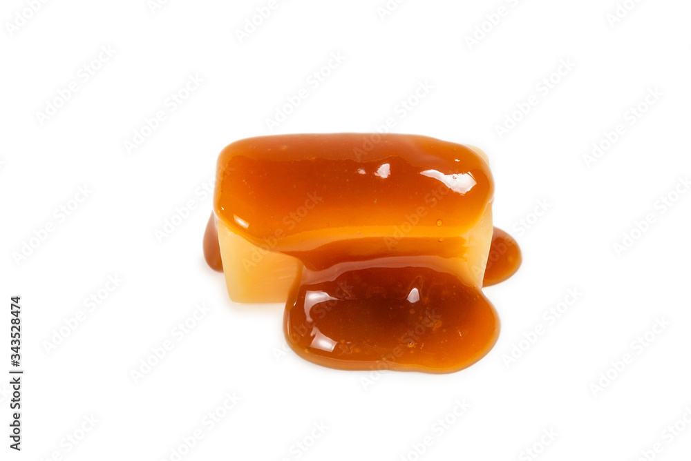 Tasty caramel candy isolated on white background.