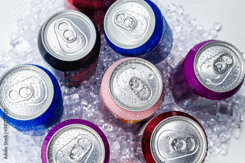 Photography Group of aluminium cans in ice, cold drink.