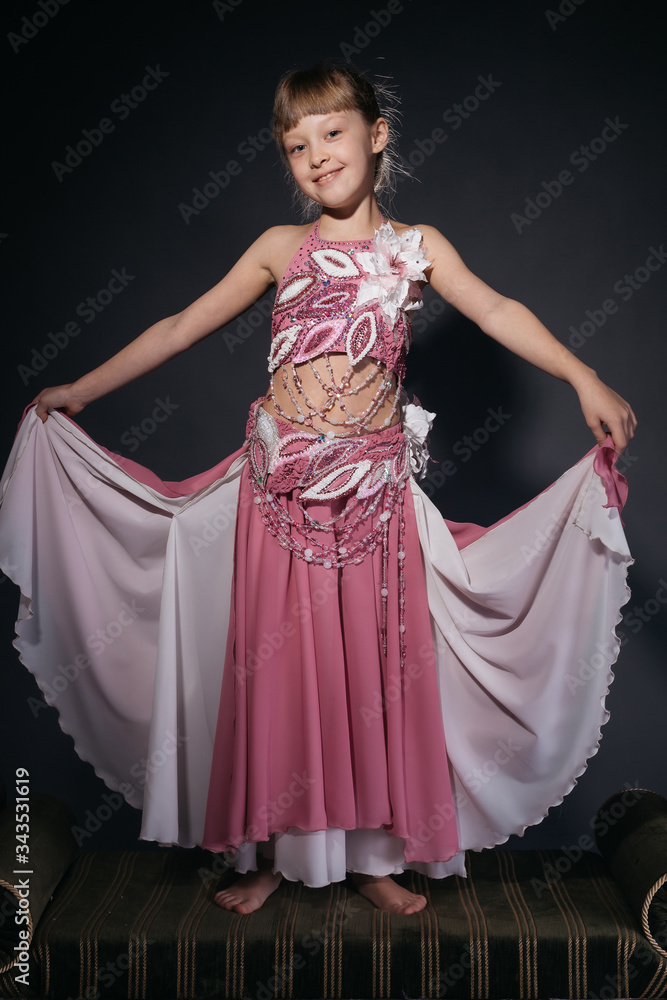 A little girl dressed as an belly dancer A little girl dressed as an belly dancer