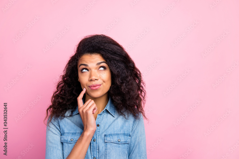 Close up photo of dreamy afro american girl look copyspace think thoughts difficult question touch finger chin wear casual style clothing isolated over pink color background Close up photo of dreamy afro american girl look copyspace think thoughts difficult question touch finger chin wear casual style clothing isolated over pink color background