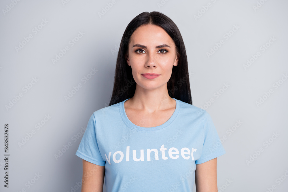 Close-up portrait of her she nice attractive lovely charming content serious girl volunteer save planet earth global change life isolated over grey pastel color background Close-up portrait of her she nice attractive lovely charming content serious girl volunteer save planet earth global change life isolated over grey pastel color background