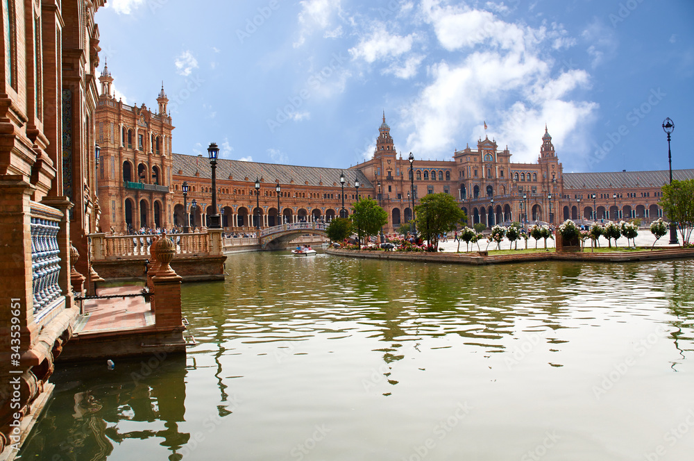 Fototapeta premium Historic buildings and monuments of Seville, Spain. Spanish architectural styles. Spain square
