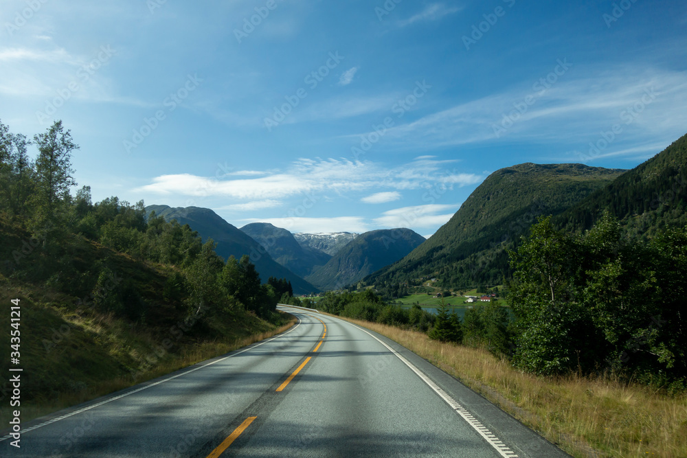 Norwegian mountain road with Josteldalsbreen glacier in the background