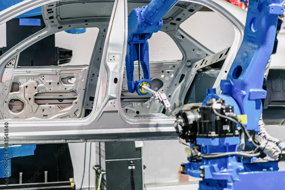 robot arm in factory robot arm in factory