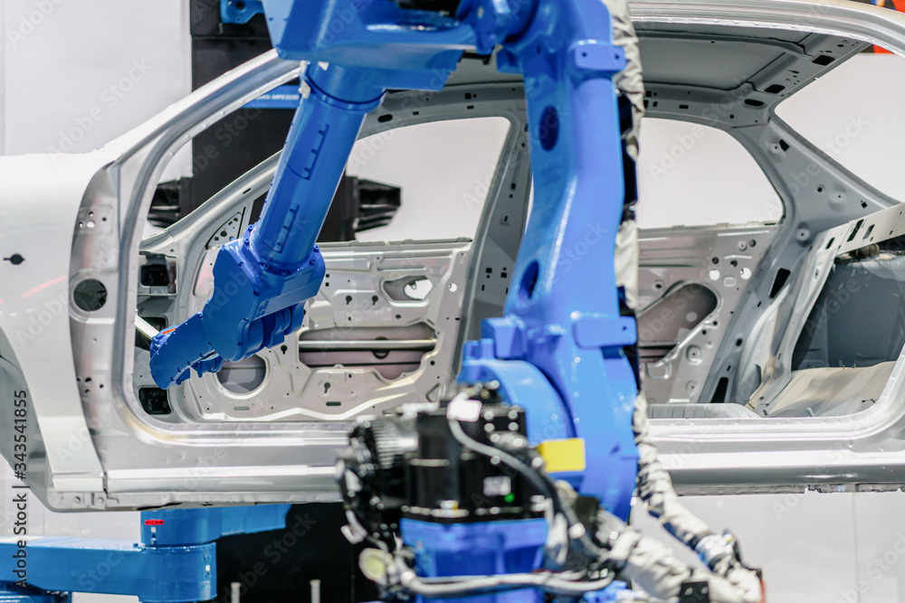 robot arm in factory robot arm in factory